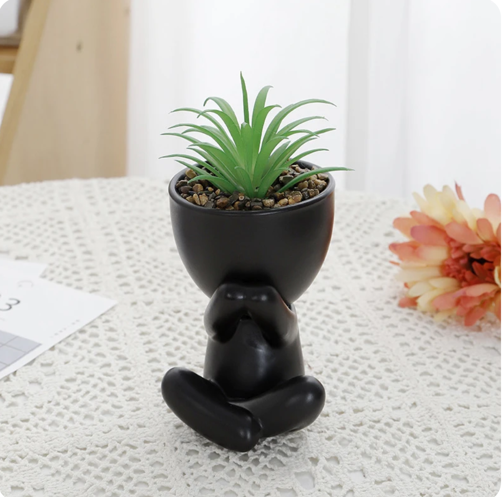 humanoid ceramic flower pot