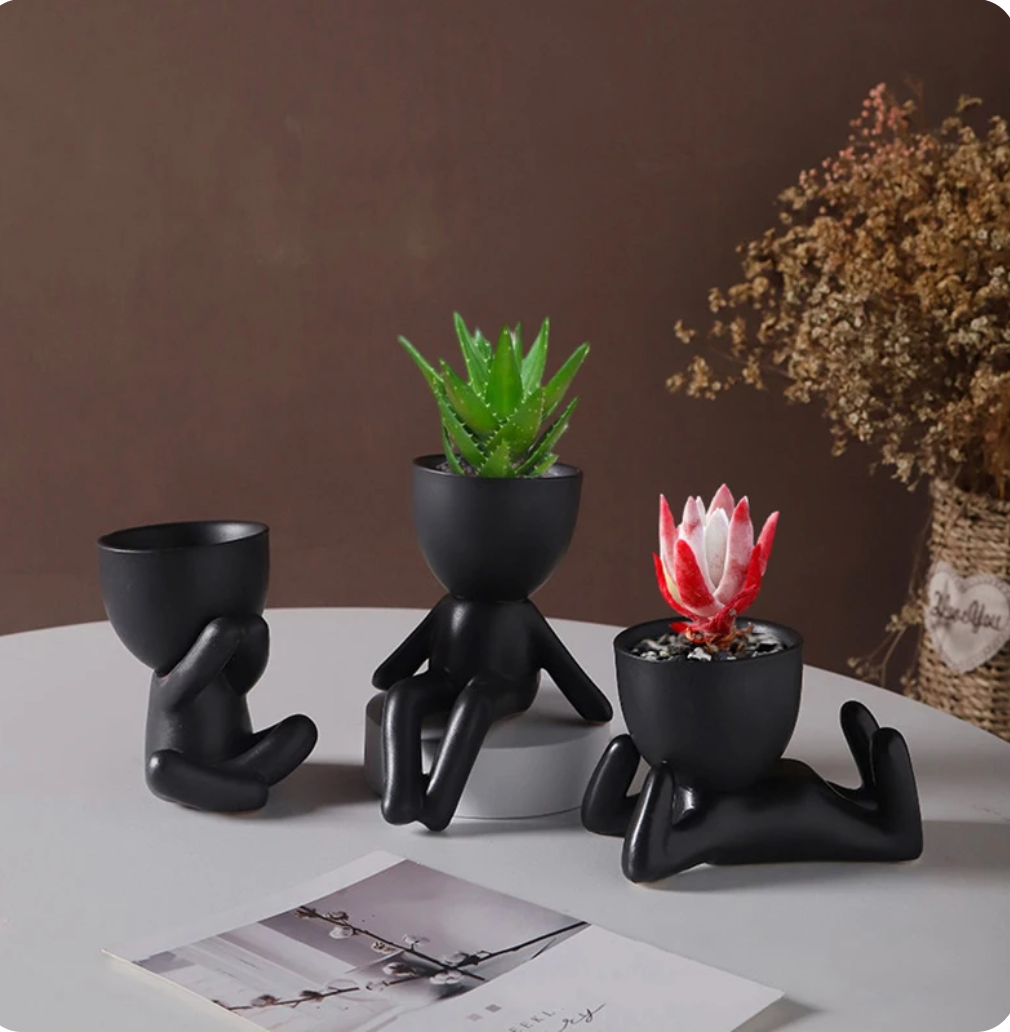 humanoid ceramic flower pot