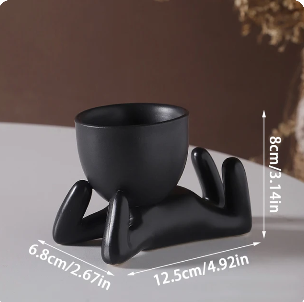 humanoid ceramic flower pot