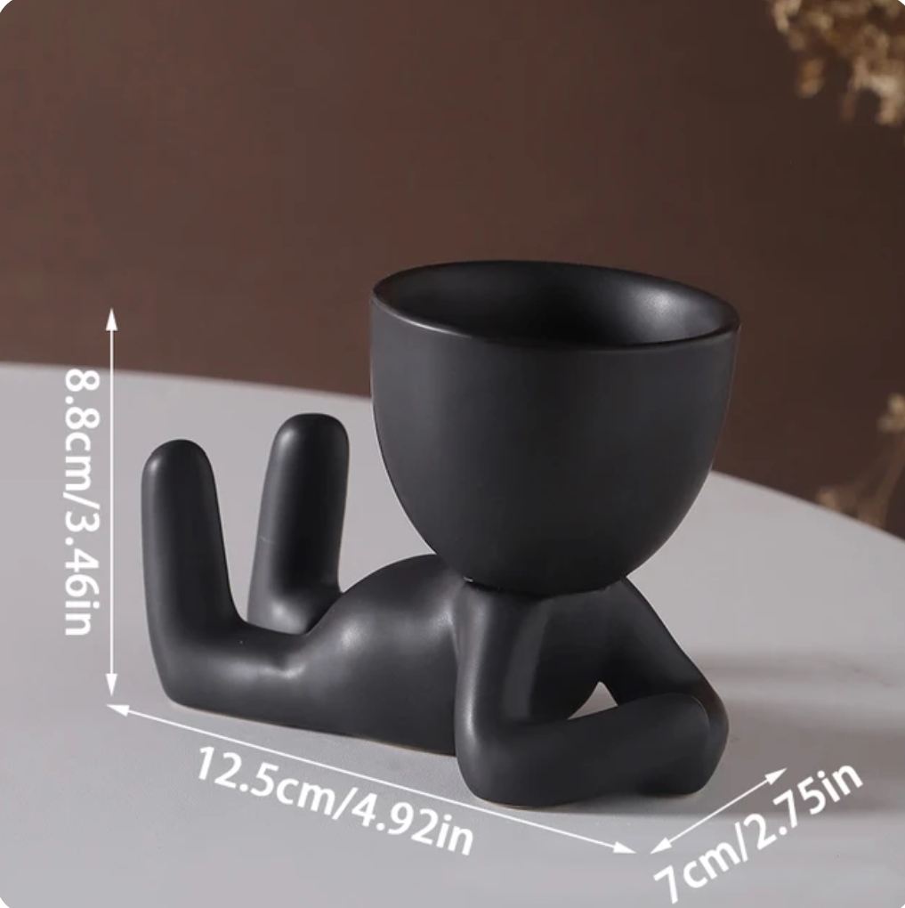 humanoid ceramic flower pot