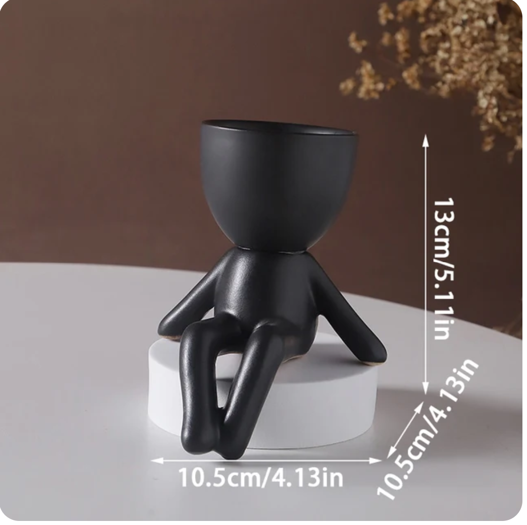 humanoid ceramic flower pot