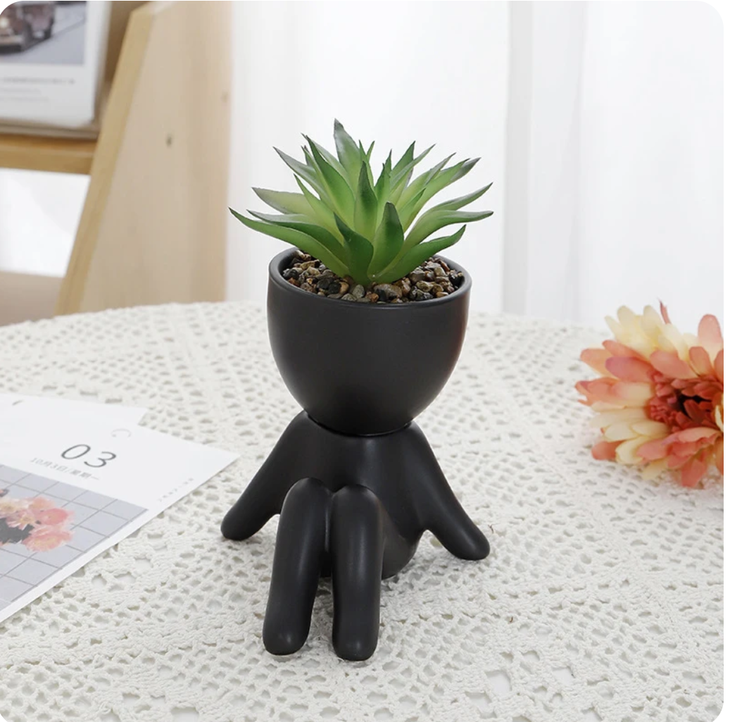 humanoid ceramic flower pot