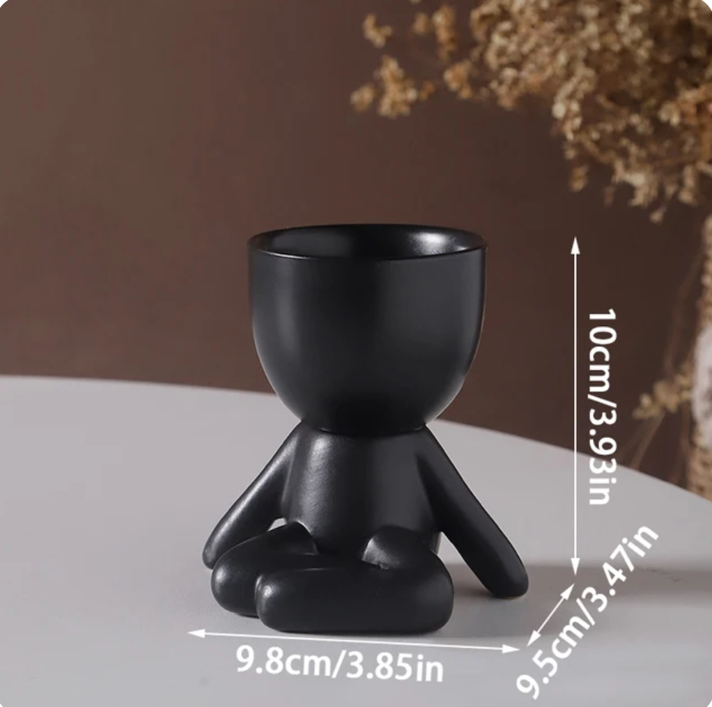 humanoid ceramic flower pot