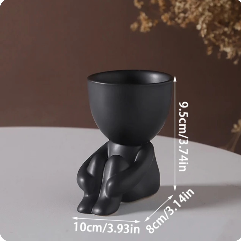 humanoid ceramic flower pot